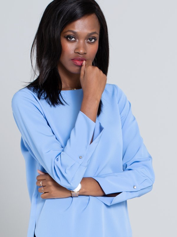 Blouses, Becky, True Blue: Classically styled , long sleeve , boxy top with a curved hem and wide cuff.