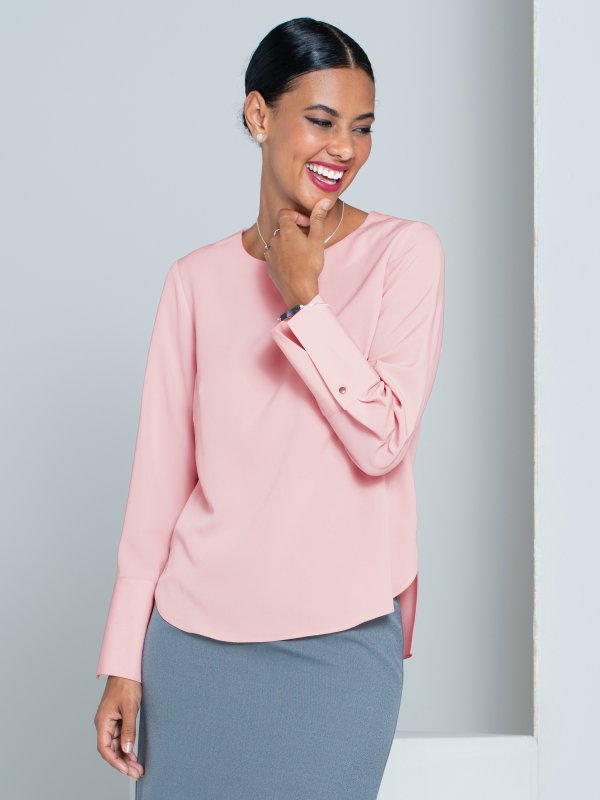 Blouses, Becky, Nude: Classically styled , long sleeve , boxy top with a curved hem and wide cuff.