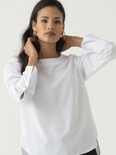 Blouses, Becky, Pearl White: Classically styled , long sleeve , boxy top with a curved hem and wide cuff.